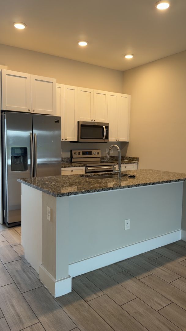 Building Photo - Duplex for rent on freshwater canal