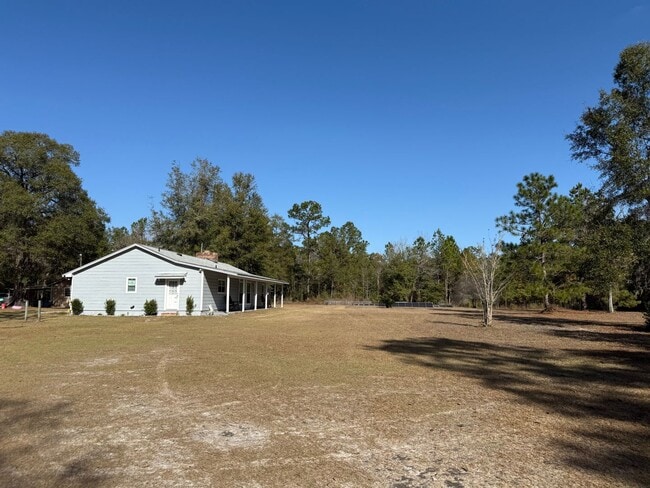 Building Photo - HUGE UPGRADED 3/2 ON 5 ACRE LOT!