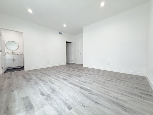 Building Photo - Chic Modern Living in Panorama City – 4 Be...