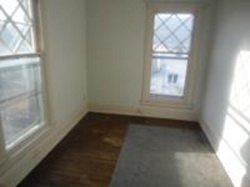 Smaller bedroom Apt 2 - 821 Tremont St