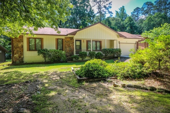 Building Photo - Two Bedroom, 2 Bath, 1-Car Garage, 1179 sq ft feet home with wood burning fireplace. and screened...