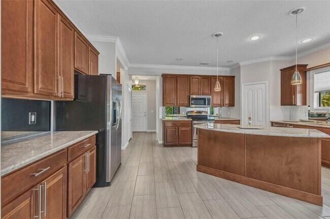 Building Photo - 2640 Suncoast Lakes Blvd