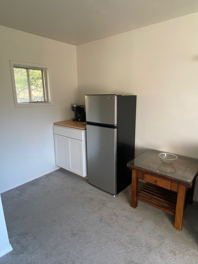 Refrigerator, coffee station and pantry cupboard - 545 S 5th St