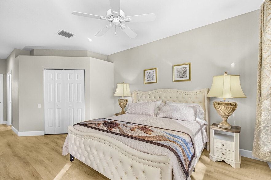 Primary Bedroom with walk in closet - 8899 Bristol Bnd