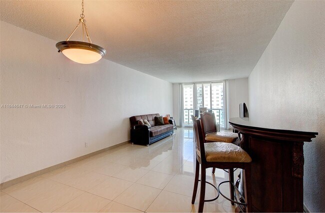Building Photo - 19380 Collins Ave