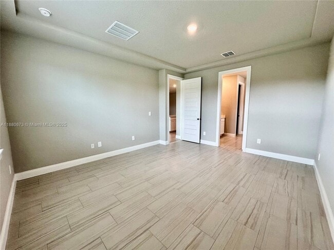 Building Photo - 9035 Dahlia Cir