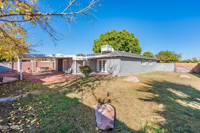 Building Photo - 6525 E Lewis Ave