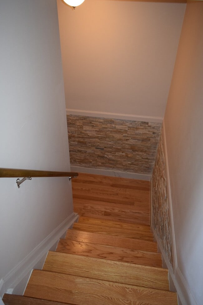 Building Photo - Updated 2-Bedroom Condo with Finished Basement, Garage, Pool, Tennis, Clubhouse