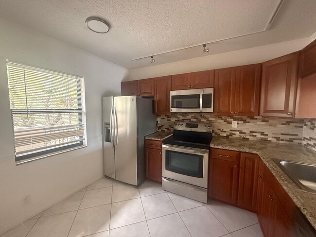 Building Photo - 3050 NW 42nd Ave