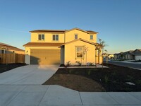 Building Photo - Stunning New-Construction two-story home 5...