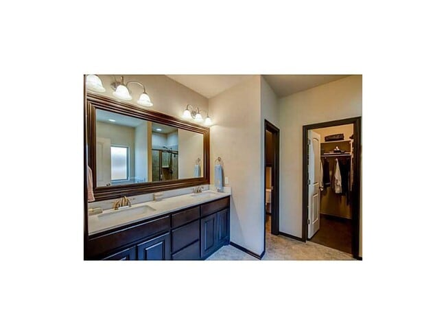 Building Photo - Contemporary Home + Wood Floors + Storm Shelter + Edmond Schools