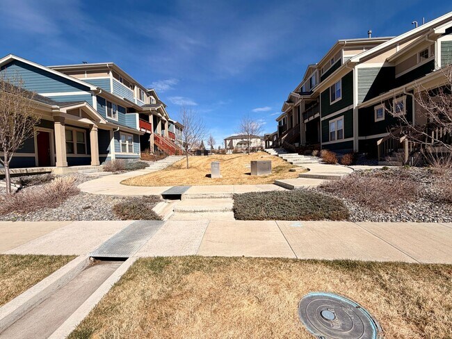 Building Photo - Move-In Ready 3-Story Townhome with Loft & 2-Car Garage