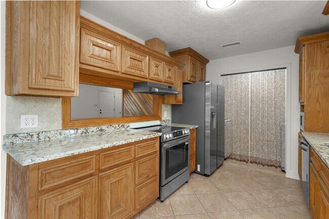 Building Photo - 9810 Kiwi Ln