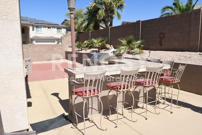 Building Photo - 4 BD + Office, 2.5 BA. 3-Car Garage w/ Pool in Litchfield Park!