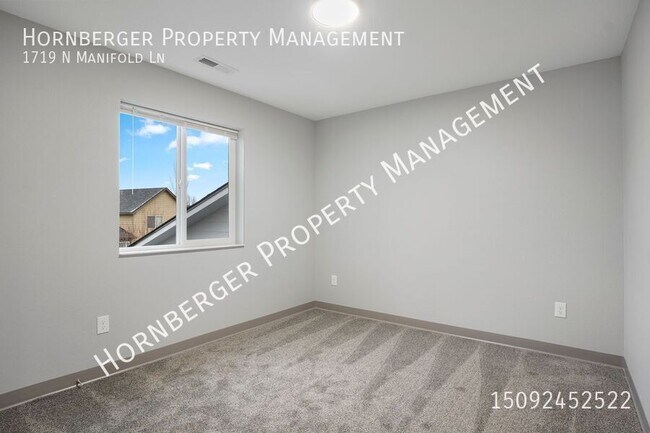 Building Photo - 1719 N Manifold Ln