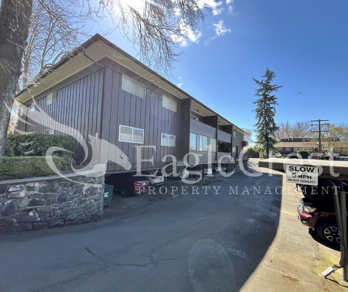 Building Photo - Convenient 2 Bedroom 2 Bathroom Condo Living "In The Trees" with On-Site Amenities