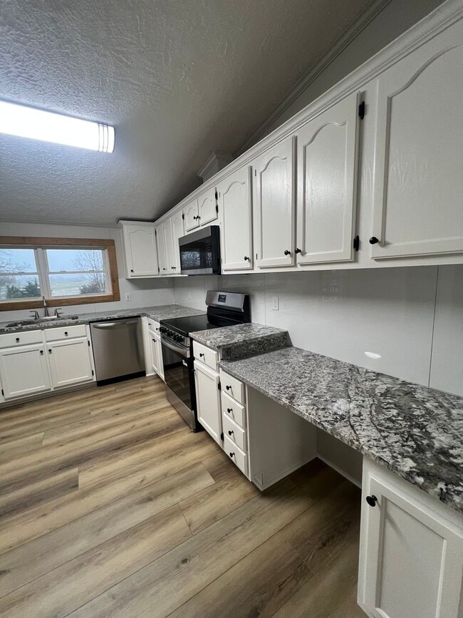 Building Photo - Peaceful Country Living on 1.4 Acres Beautifully Remodeled 3 Bed / 2 Bath Home on Ficklin Road