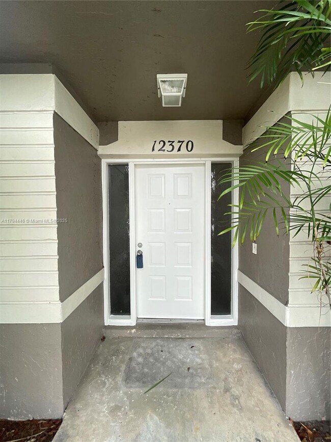 Building Photo - 12370 SW 52nd Pl