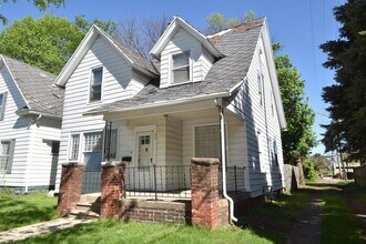 Building Photo - Price Reduced! 4 bedroom 2 story Single Family Home