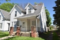 Building Photo - Price Reduced! Near local Universities and Entertainment 4 bedroom 2 story Single Family Home