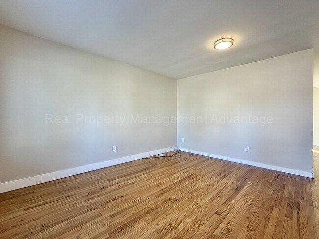 Building Photo - Solid Brick and Renovated with New Kitchen and Two Full Baths!