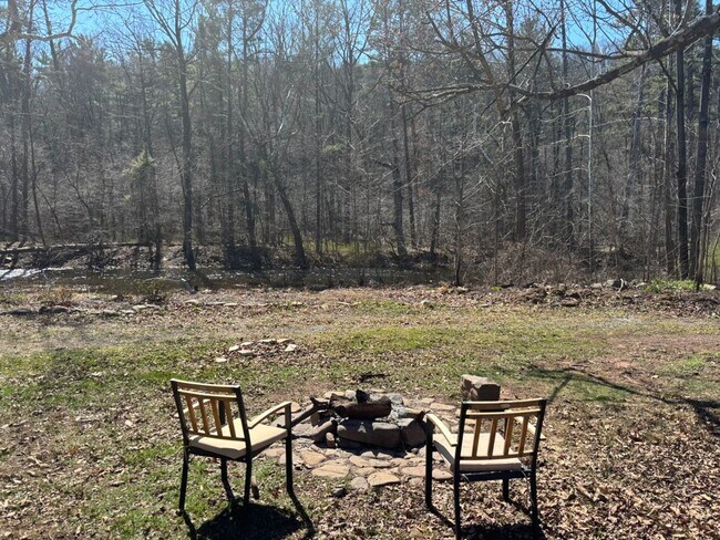 Building Photo - Rare Oasis: 2BR Home with Large Loft Area on 1.5 Acres Bordering National Forest and Fronting Dry...