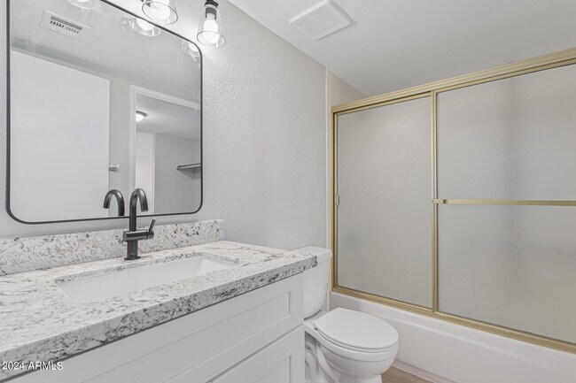 Building Photo - 7930 E Camelback Rd