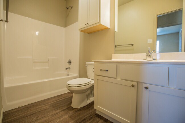 Building Photo - Pre-Leasing - Eye-Catching Home with a Bathroom in Every Bedroom!