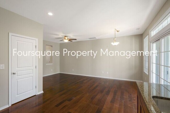 Building Photo - Charming Townhome with Open Layout, Back Patio & One-Car Garage – Near RTP, RDU & Everyday Conven...