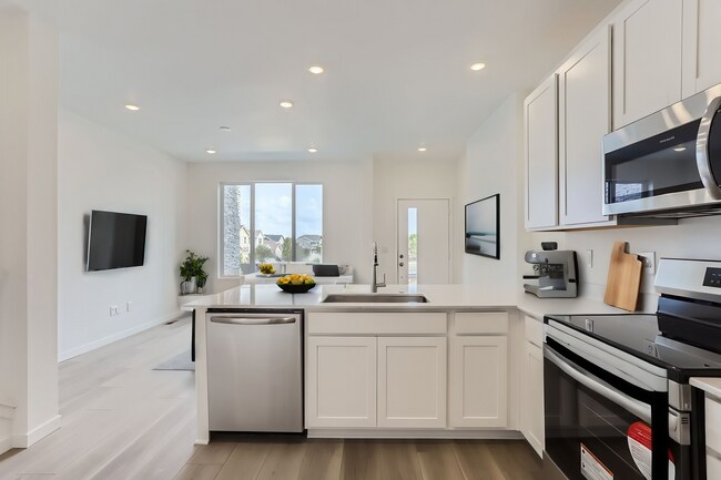 Kitchen and Living Room (virtually staged) - 9142 Gladiola Way