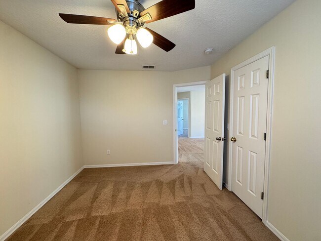 Building Photo - Spacious 4-Bedroom Home with Private Pool and Modern Comforts