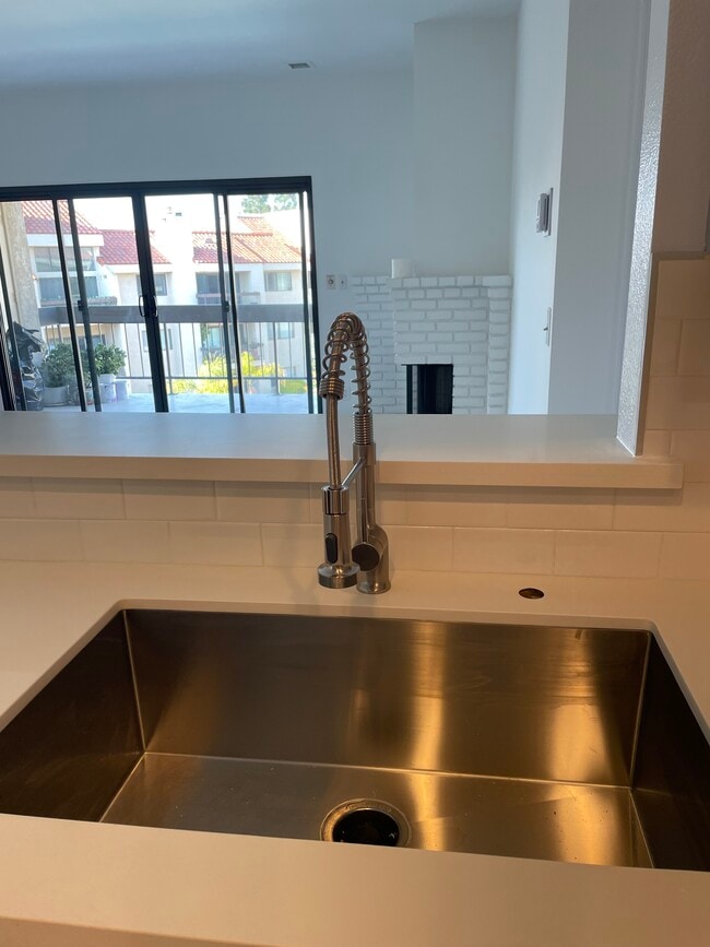 Brand-new kitchen sink/faucet - 8180 Manitoba St