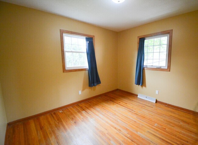 Building Photo - Beautiful multi-level with Gorgeous Yard and LOTS of Storage!