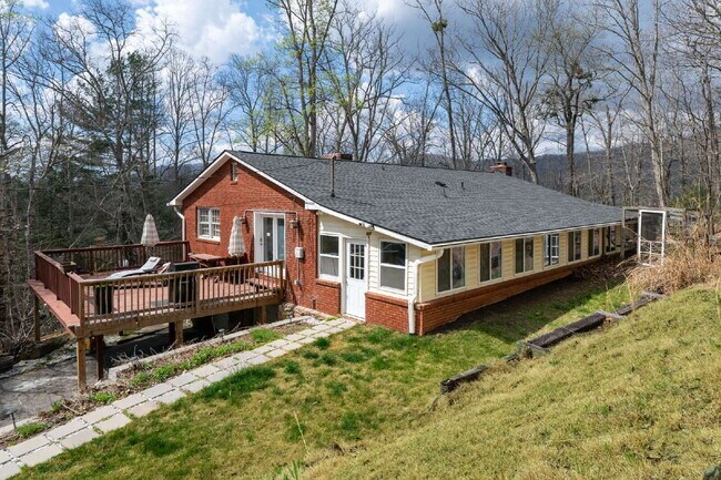Building Photo - Fairview Retreat | 3BR/3BA with Finished Basement, 2-Car Garage & Private Yard — 17 Min to Asheville