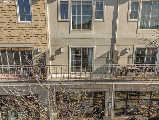 Building Photo - Main Street Living with Granite Kitchen, Gas Fireplace, and MAX Line Access