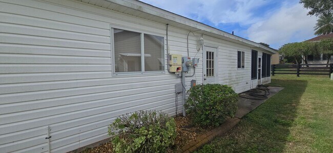 Building Photo - Move-In Ready 2BR/2BA Home with Solar & Bo...