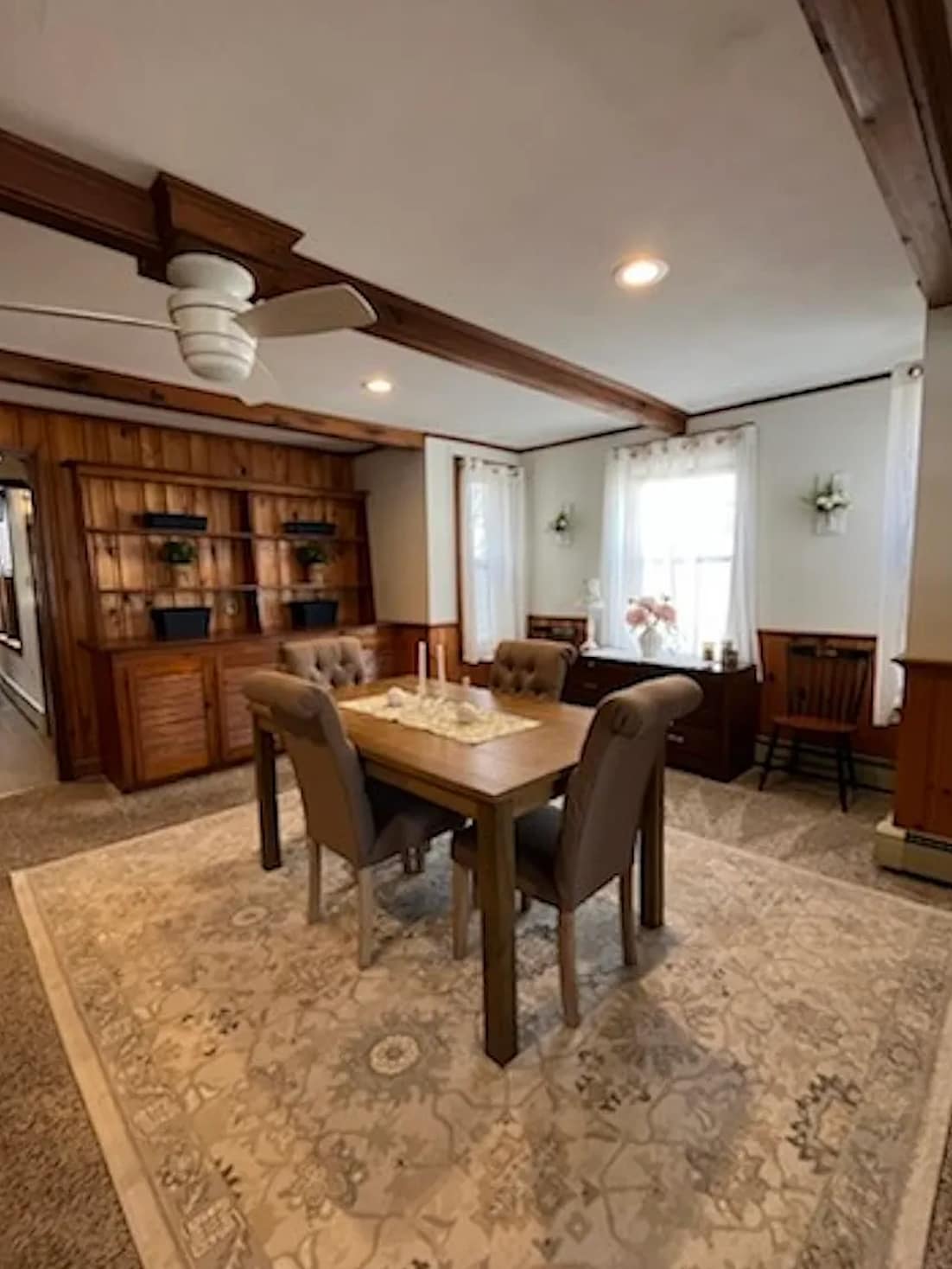 Dining room with built in shelves and storage - 68 Main St