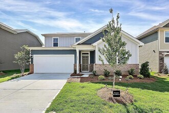 Building Photo - Home with 4 bedrooms, 3 full baths Fence in Yard