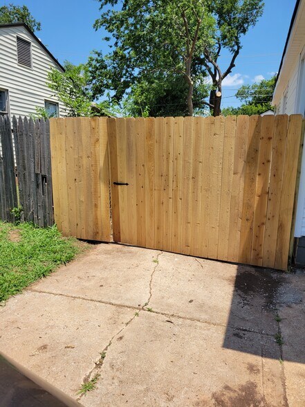 Swinging gate that leads to detached garage - 504 N Marshall Dr