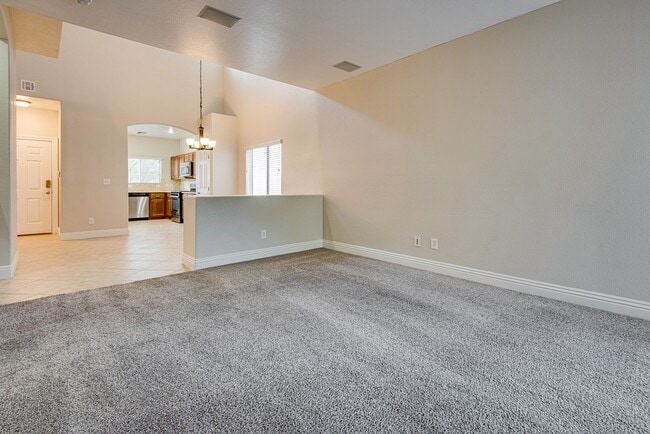Building Photo - Spacious 3-Bedroom Home Featuring Downstai...