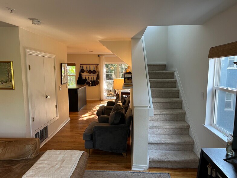 Stairs lead up to bedrooms. - 1641 N Washington St