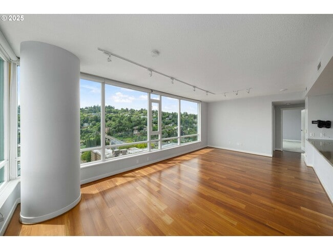 Building Photo - Modern 2-Bed/2-Bath Condo with Balcony & Prime Downtown Location
