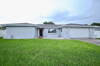 Building Photo - Gorgeous 4/2 Pool Home with a Covered Patio and a Large Fenced Backyard Located in Dr. Phillip's ...