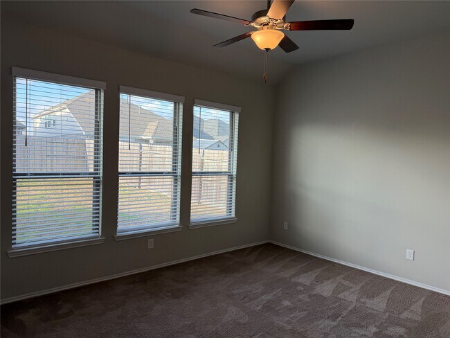 Building Photo - 8711 Windsong Trail Dr