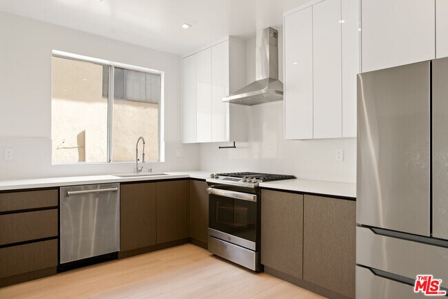 Building Photo - 10630 Wilkins Ave