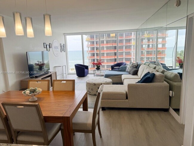 Building Photo - 10275 Collins Ave