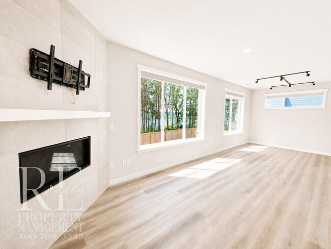 Building Photo - Luxury Poulsbo Retreat with Water Views, Covered Deck & Designer Finishes