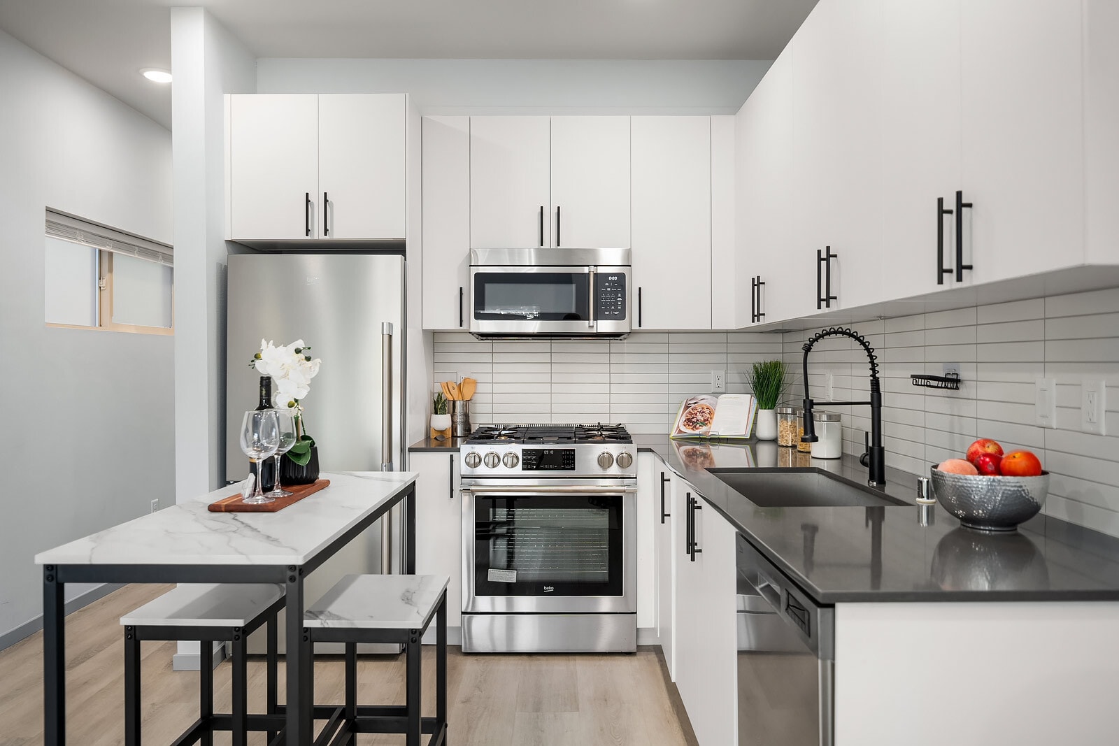 kitchen and a gas range - 8338 27th Ave NW