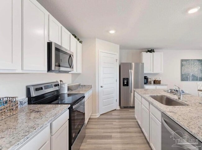 Building Photo - 5856 Belmont Stakes Rd