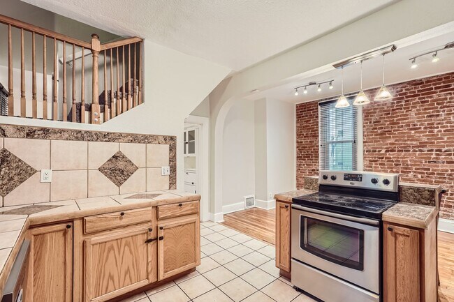 Building Photo - LOCATION! Blocks to Bronco's Stadium, light rail, park, Sloan's Lake.  ALL Utilities Included! Ov...